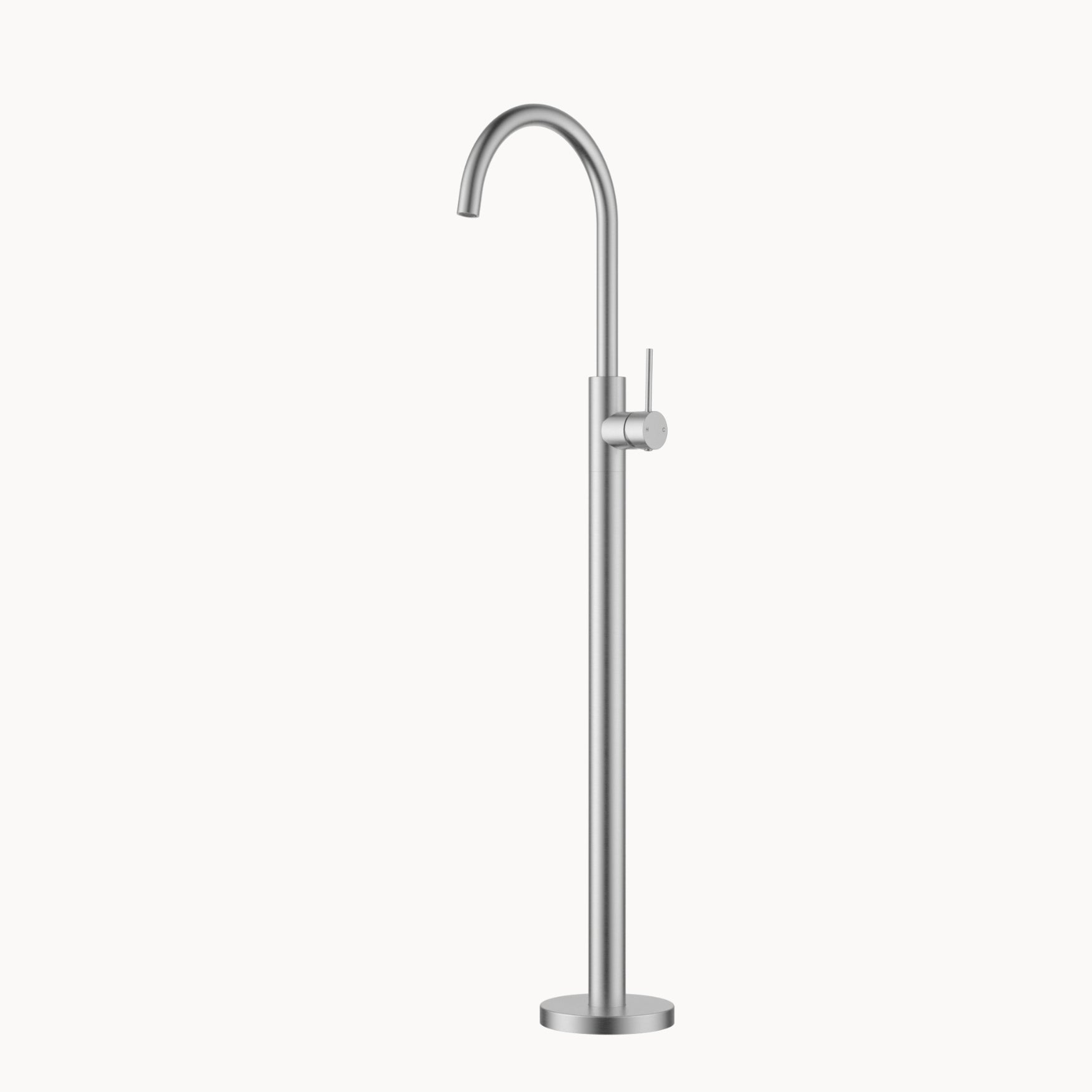 Stainless steel freestanding bathtub faucet on a white background