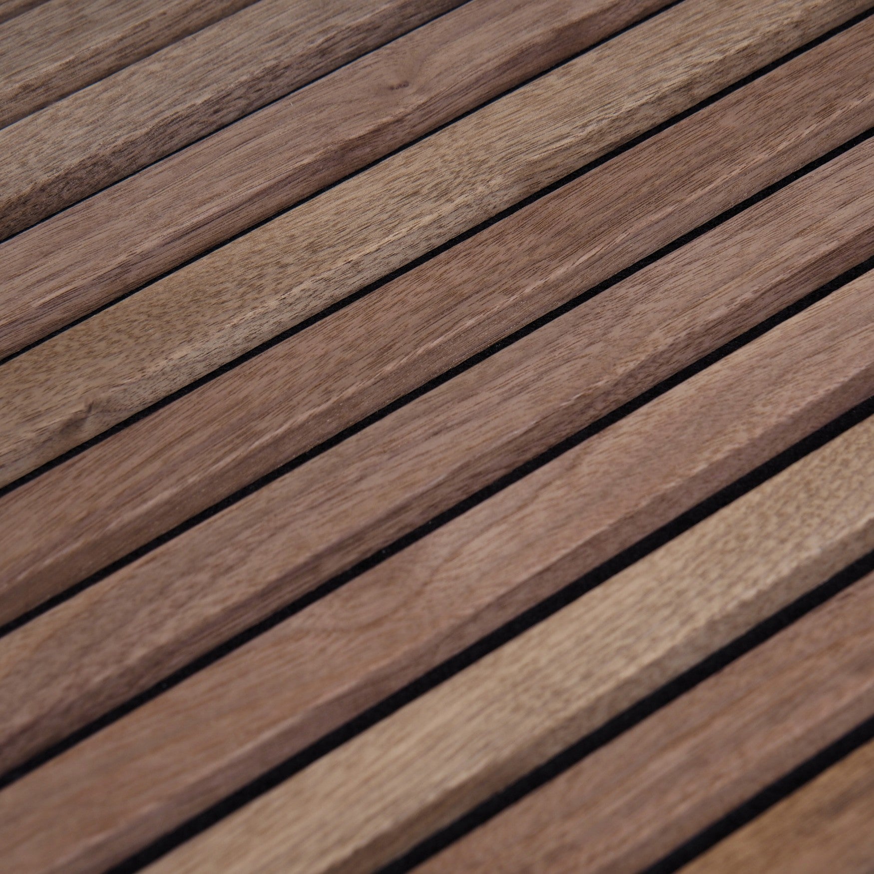 Natural grain pattern on acoustic wood panel for premium interior finish