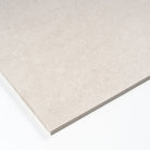 Close-up of Dulcet Beige stone-look tile showcasing subtle veining