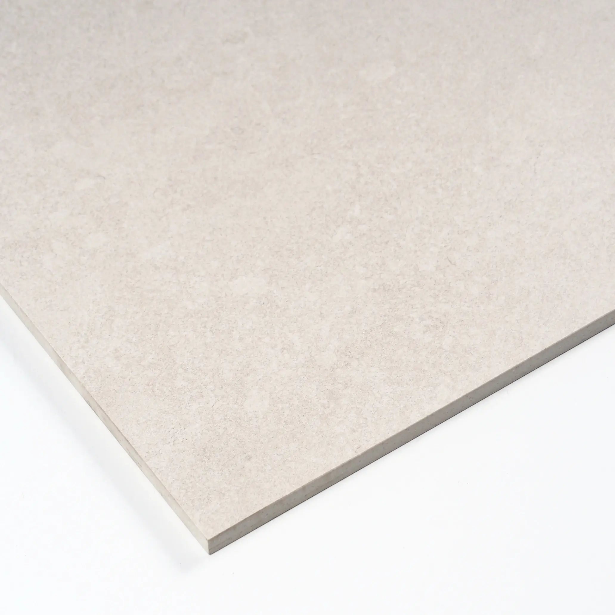 Close-up of Dulcet Beige stone-look tile showcasing subtle veining