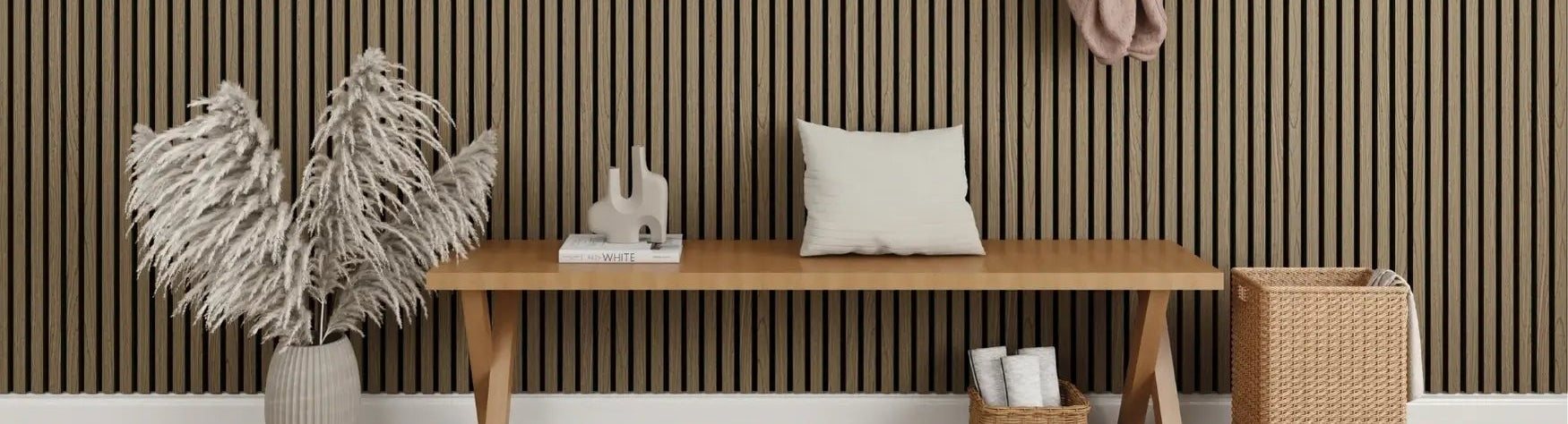 Nest living room with wooden bench, decorative items, and acoustic wall panel