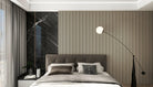 Linear slatted acoustic panel with even spacing and black backing