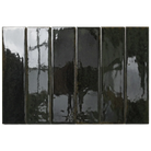 Six glossy rectangular ceramic tiles in a dark charcoal black color, arranged side-by-side against a plain white background.