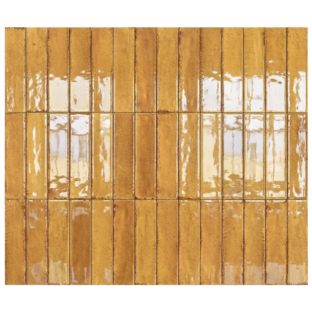 Rectangular glossy ceramic wall tiles in a warm golden-brown color, arranged in a grid pattern with grout lines.